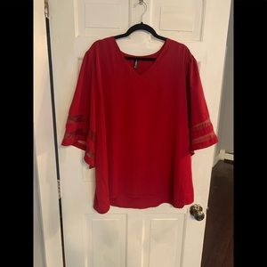 Red blouse with flare sleeves
